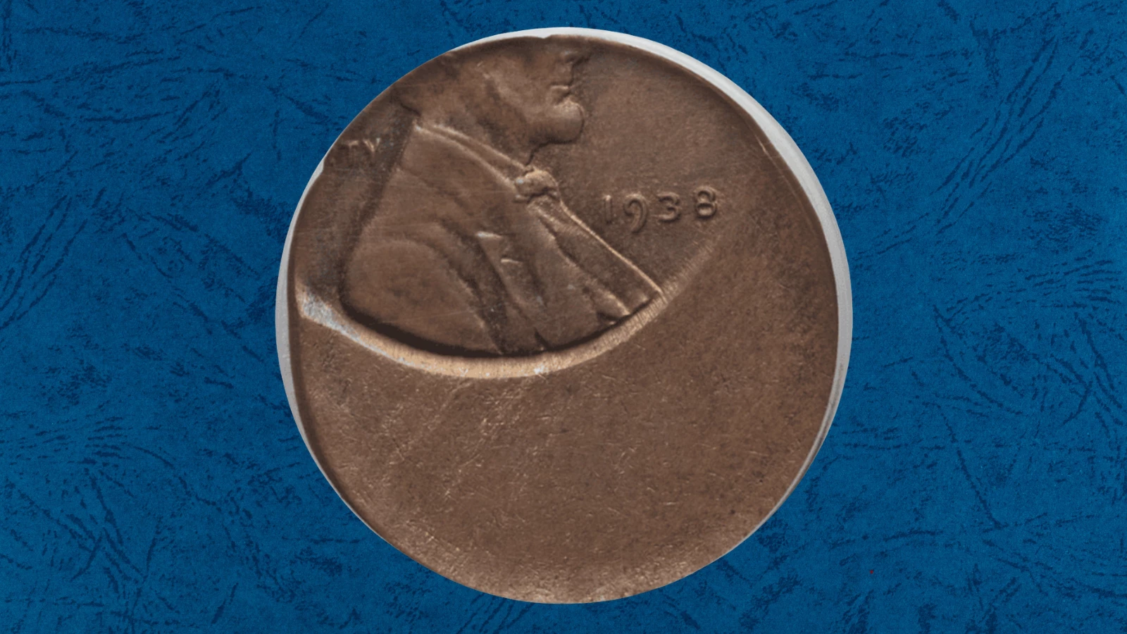 1938 wheat penny off-center strike error showing blank crescent and shifted Lincoln portrait